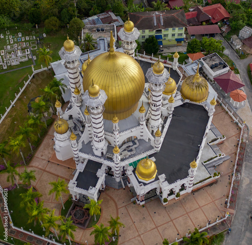 Aerial view of the beautiful Ubudiah Mosque in Kuala Kangsar, Perak, Malaysia. photo