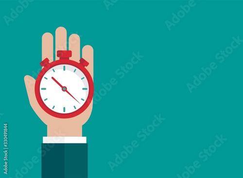 Hand with red stopwatch isolated on blue background.