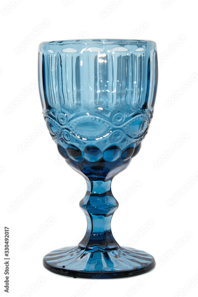 Classic glass wine glass in blue on a white background. Isolated Classic glass wine glass in blue on a white background. Isolated
