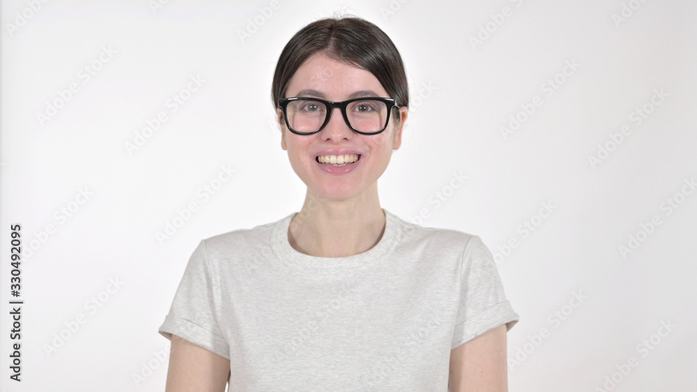 The Cheerful Woman Smiling at Camera on White Background The Cheerful Woman Smiling at Camera on White Background