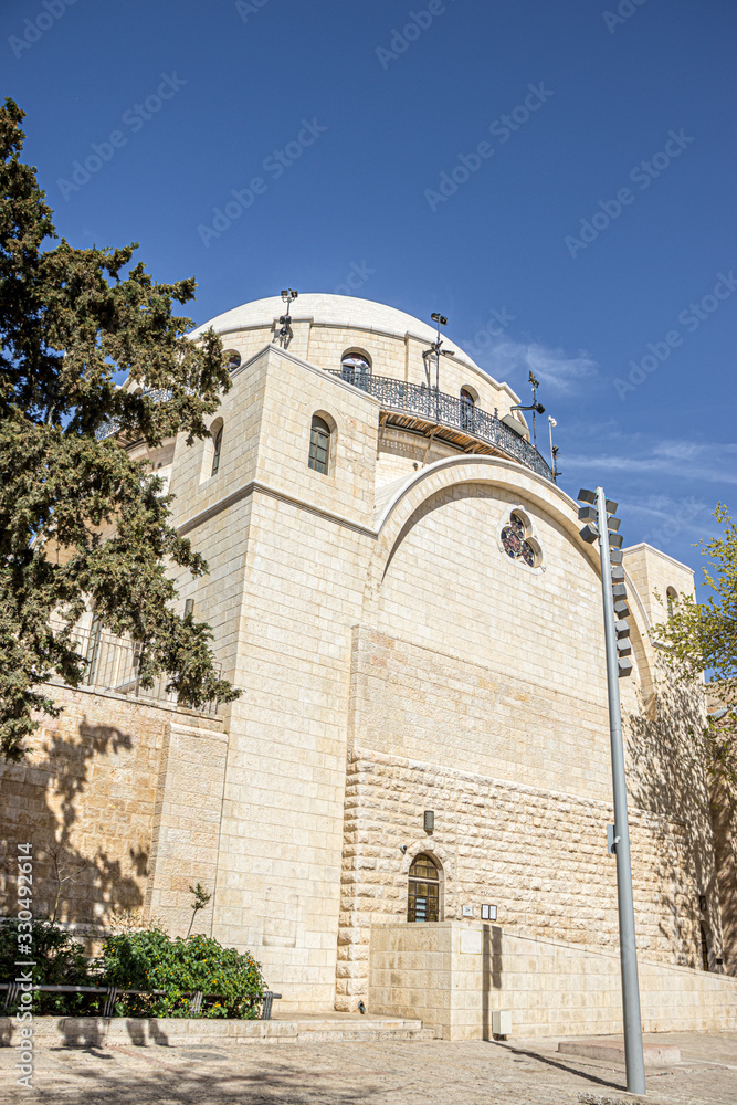 Fototapeta premium The Hurva Synagogue, is a historic synagogue located in the Jewish Quarter of the Old City of Jerusalem, Israel. The building was destroyed in the war and restored, low angle view, daylight.