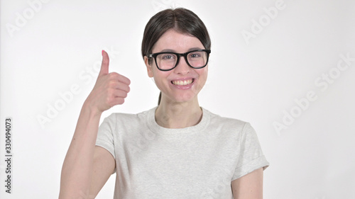 The Young Woman Showing Thumbs Up on White Background