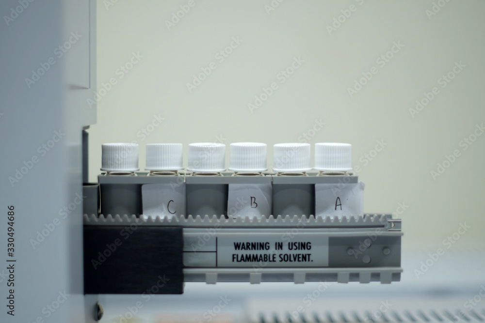 Soft focus of Scientific experiments in the lab,Experimental vaccine for disease treatment,Invented antiretroviral drugs