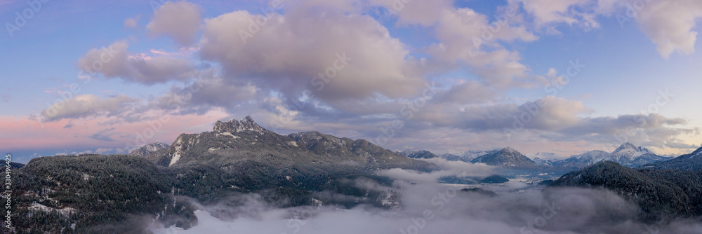 wonderful cloudscape in tyrol alps at sunset dawn with ground fog