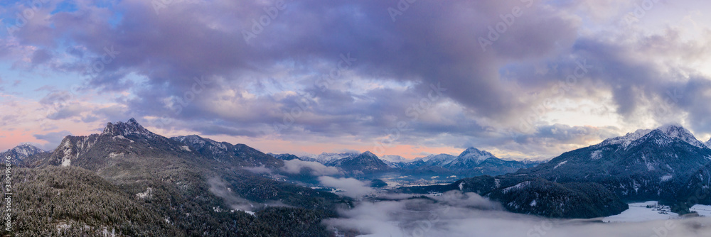 austrian mountain alps with beautiful sky cloud mood and ground fog at autumn austrian mountain alps with beautiful sky cloud mood and ground fog at autumn
