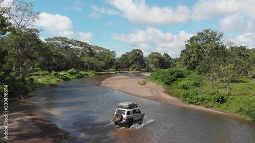 4x4 vehicle river crossing in wilderness of Corcovado Costa Rica