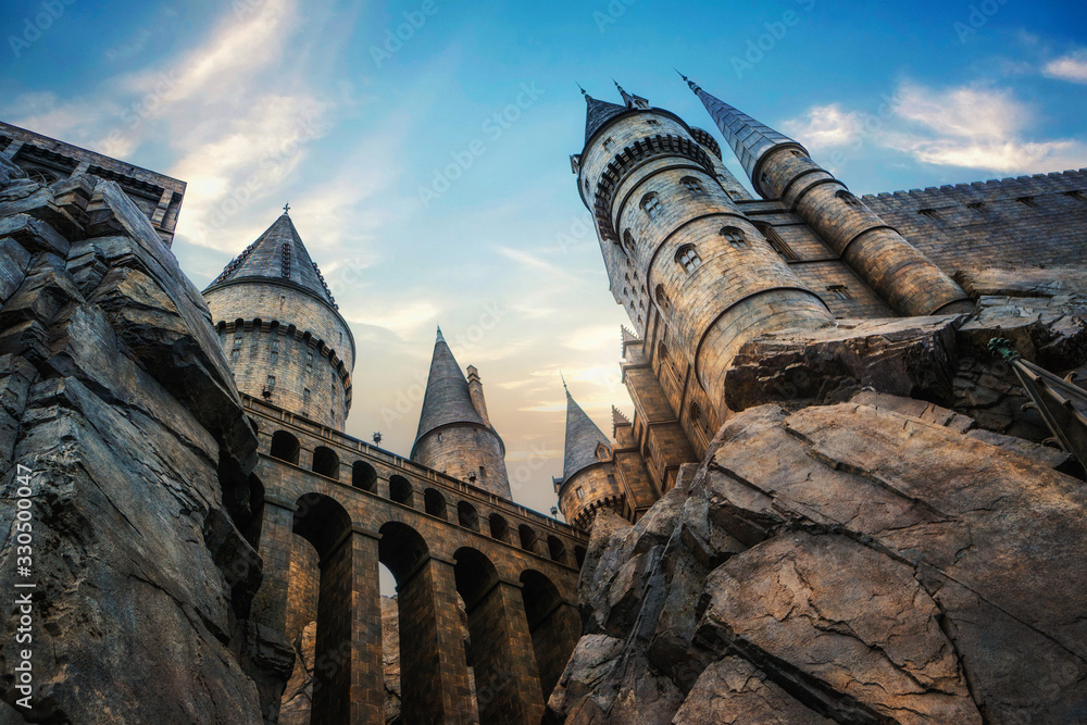Fototapeta premium Hogwarts castle at Universal Studio Japan with blue sky