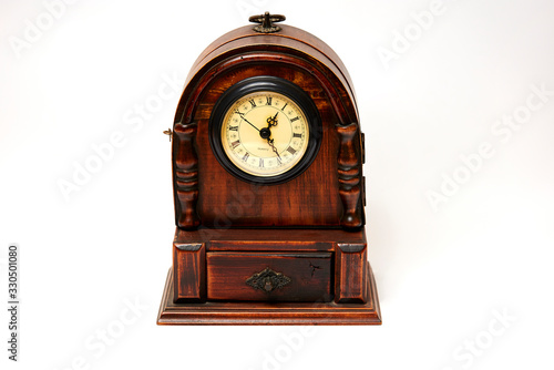 beautiful old wooden clock on white background