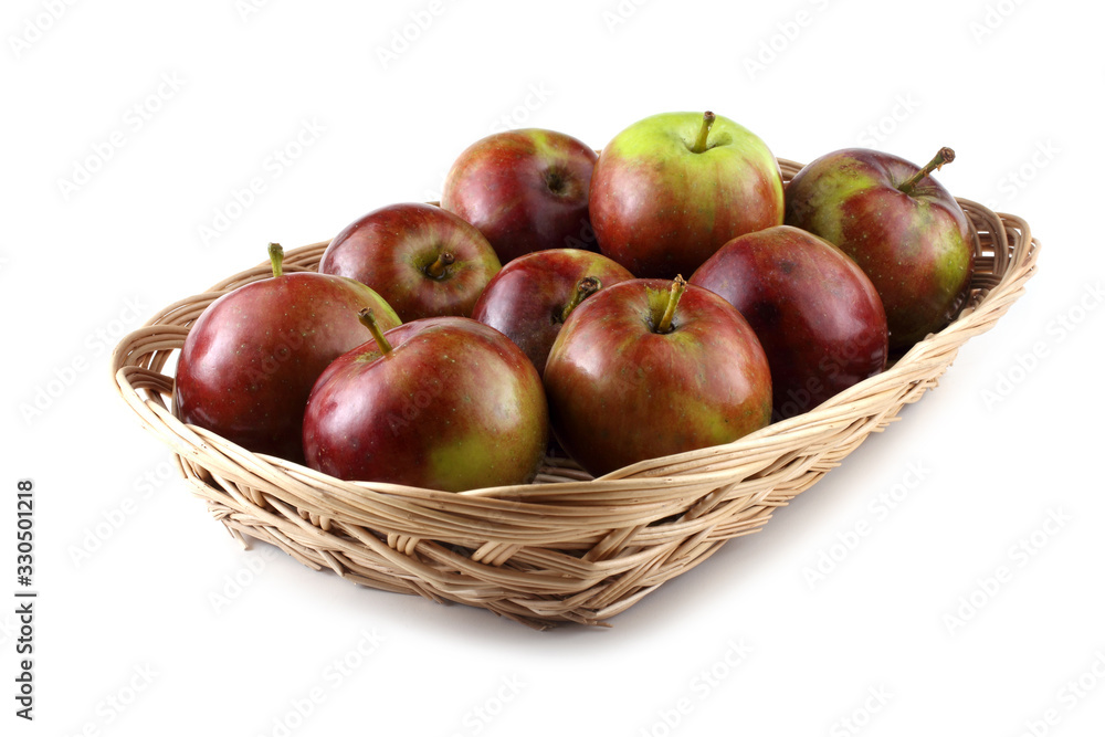 Apples on wicker dish Apples on wicker dish