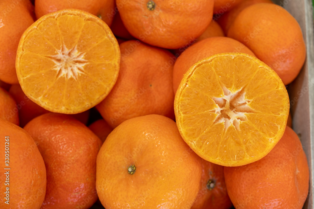 Red orange Mandarins or Clementines at an agricultural exhibition Red orange Mandarins or Clementines at an agricultural exhibition