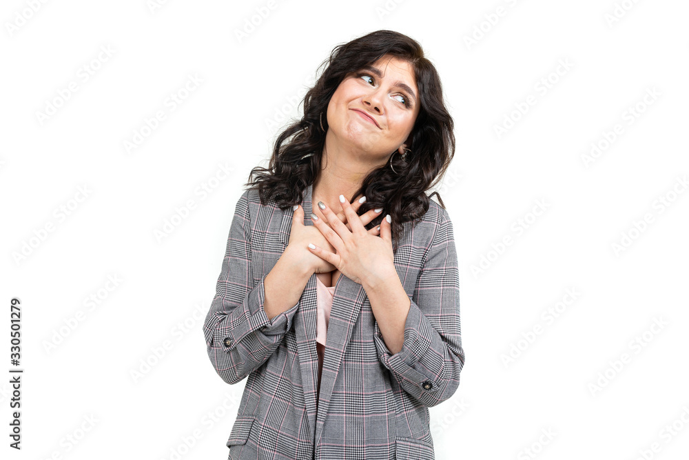 girl in a classic checkered gray jacket asks for forgiveness on a white background girl in a classic checkered gray jacket asks for forgiveness on a white background