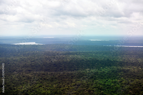 large river in the wild jungle and nature park from a helicopter © константин константи