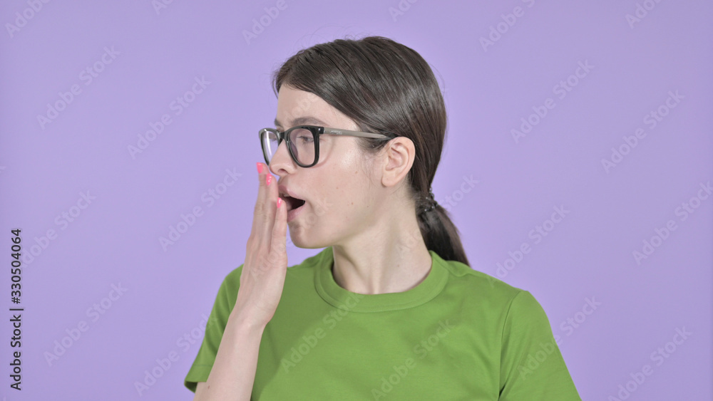 The Sleepy Young Woman having Yawn on Purple Background