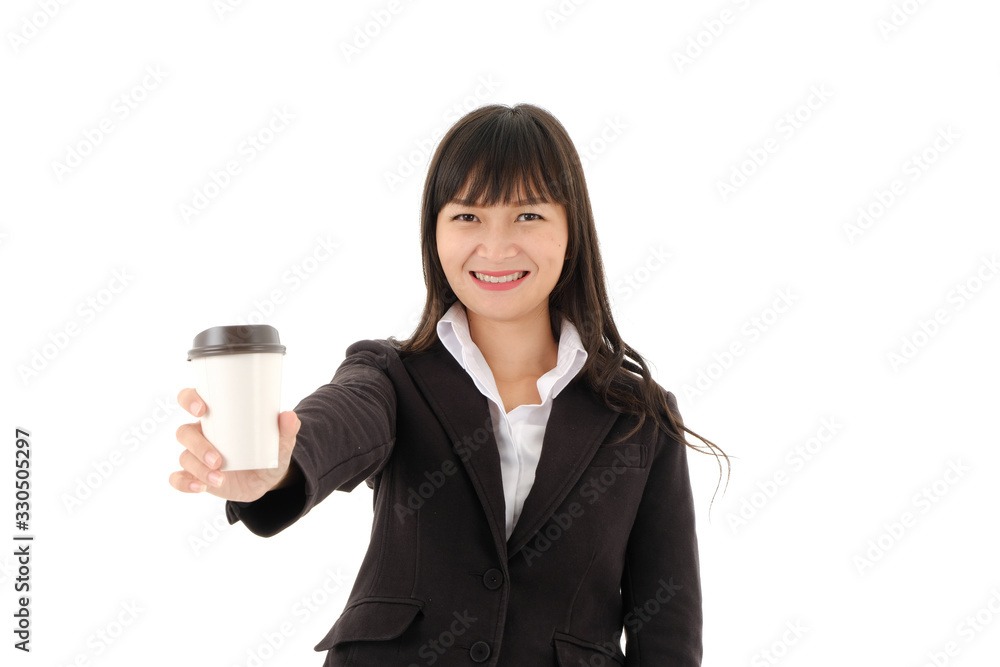Smiling Young Asian business woman in black suit with long hair holding A cup of coffee and Bring forward on white background,studio isolated. Smiling Young Asian business woman in black suit with long hair holding A cup of coffee and Bring forward on white background,studio isolated.