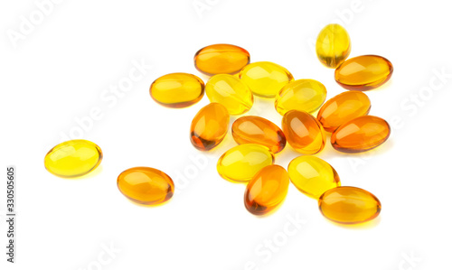 Omega 3 fish oil capsules on  the White Surface. Closeup