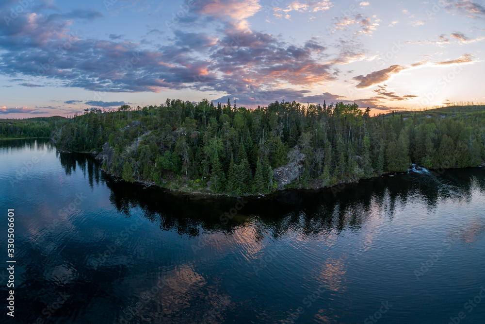 The Eagle Lake side view of Buzzard Falls and the portage into Winnange Lake located in Northwest Ontario, Canada.