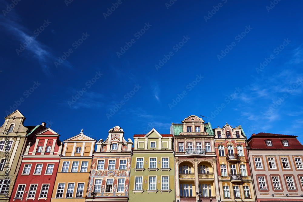 Old market square with historic tenement houses in Poznan.