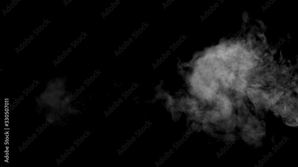 slow motion vapor steam rising over black background slow motion vapor steam rising over black background