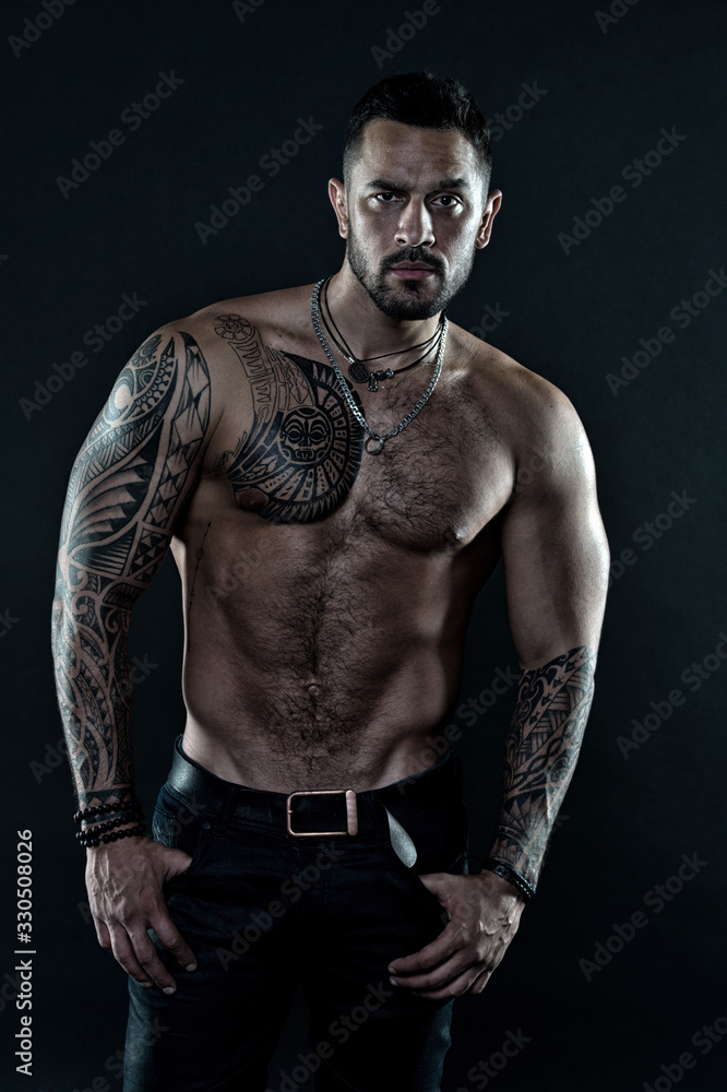 Muscular Man. Beautiful male torso. sexy athletic guy has naked body. sportsman with tattoo on strong body. bodybuilding and sport nutrition. protein and steroids effect. healthy dieting for fit body