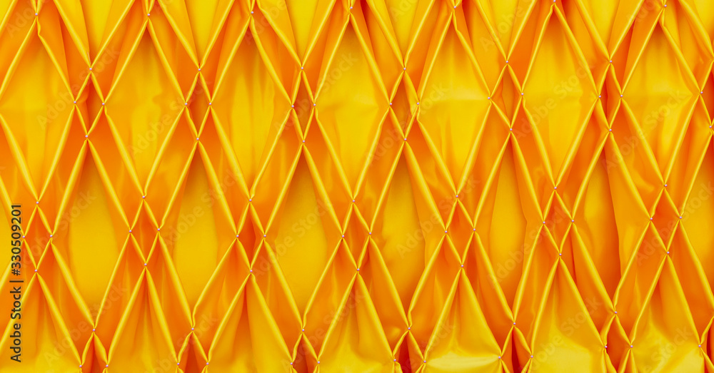 The yellow fabric is formatted as a beautiful triangle. The yellow fabric is formatted as a beautiful triangle.