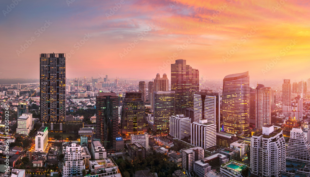sunset rooftop view bangkok city office buildings tower, hotel and living, condominium in bangkok city skyline top view Downtown and business office bank financial in capital city of thailand asian