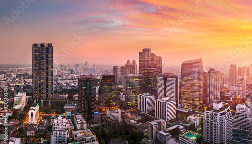 sunset rooftop view bangkok city office buildings tower, hotel and living, condominium in bangkok city skyline top view Downtown and business office bank financial in capital city of thailand asian
