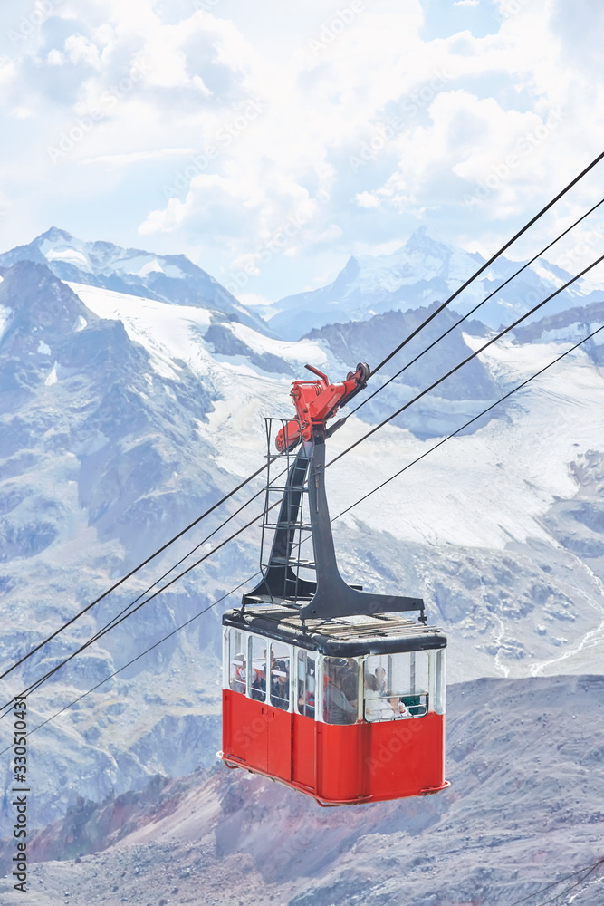 Fototapeta premium Attraction cable car for climbing the mountain.