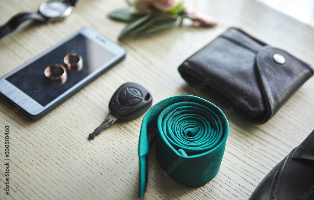 different accessories of a businessman for creating a style of a people lie on a wooden background different accessories of a businessman for creating a style of a people lie on a wooden background