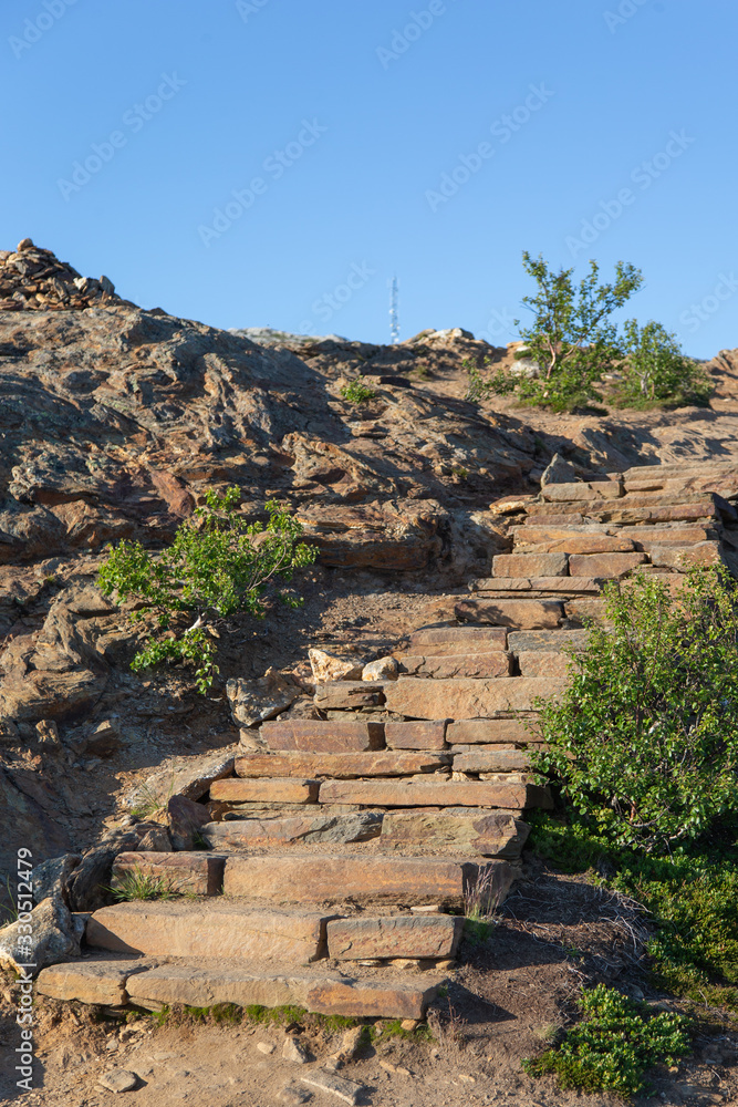 Stone stairs on the way up to Keiservarden outside Bodo city built by Sherpas from Nepal.