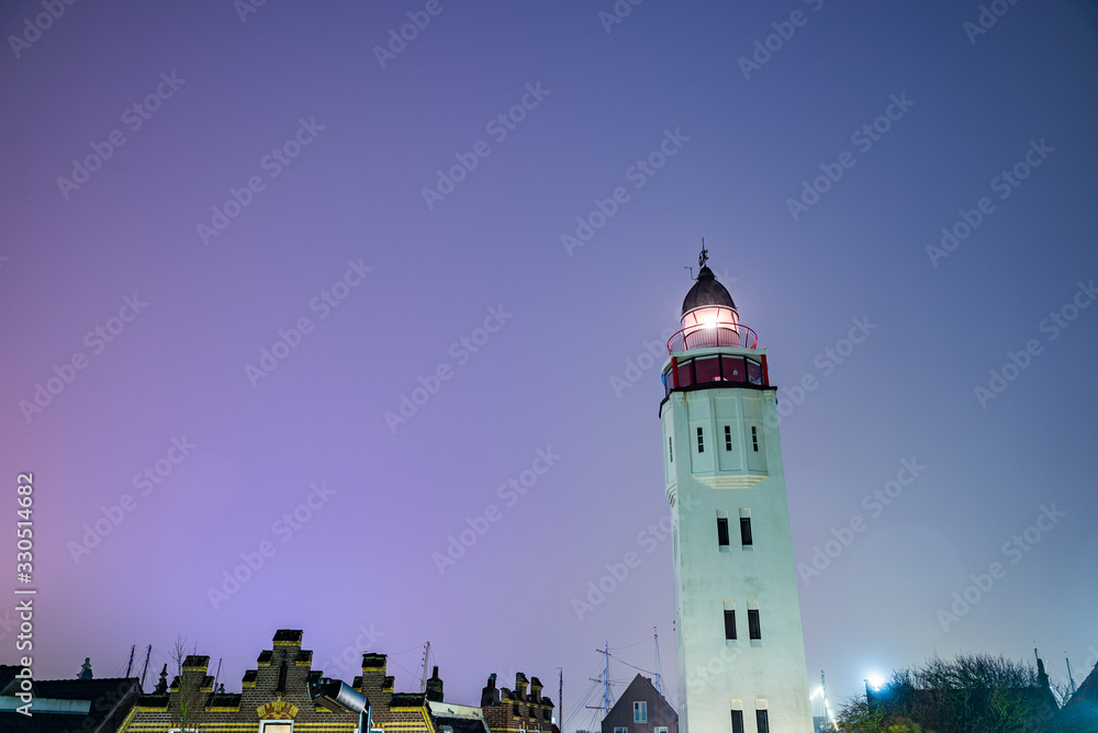 Harlingen, Netherlands - January 09, 2020. Lighthouse at night