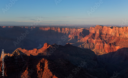 Red canyons of Grand Canyon during sunset  USA