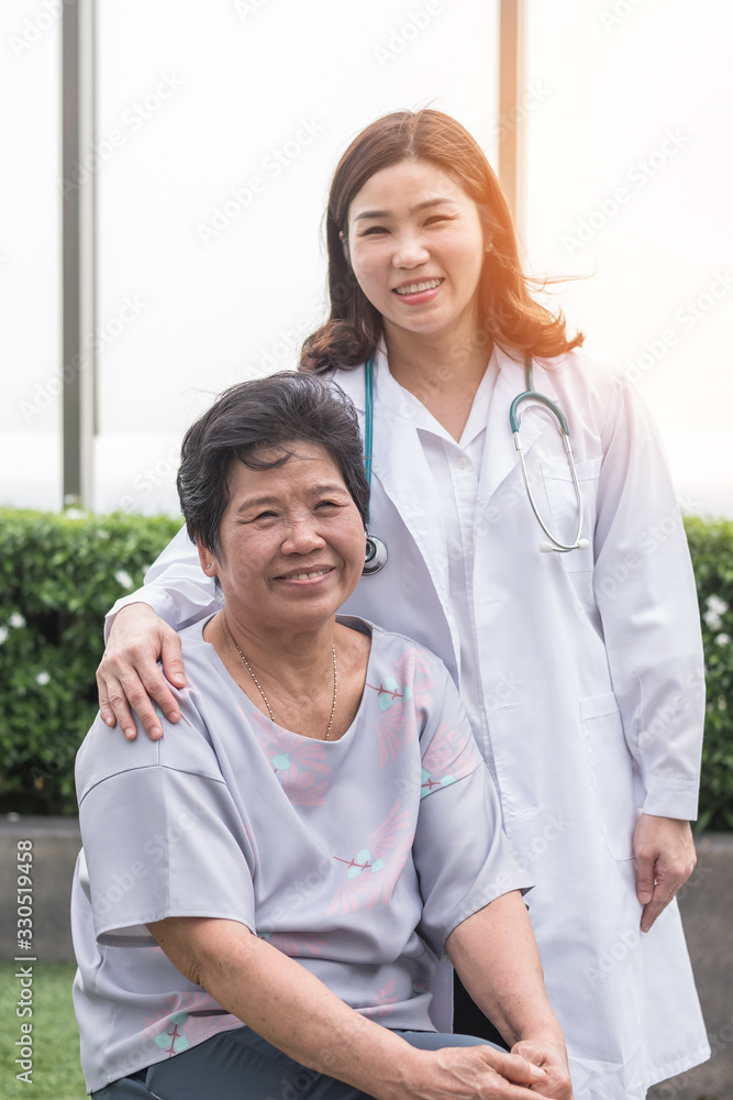 Elderly senior dementia patient (aging old adult person) in nursing hospice home with geriatrician doctor having happy medical health care from hospital carer or caregiver healthcare service Elderly senior dementia patient (aging old adult person) in nursing hospice home with geriatrician doctor having happy medical health care from hospital carer or caregiver healthcare service