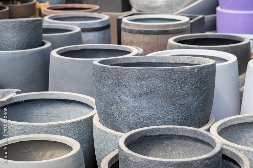 Lot of porcelain flower pots for sale at the garden store Lot of porcelain flower pots for sale at the garden store