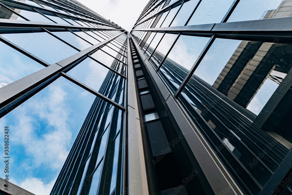Blue skyscraper facade. office buildings. modern glass silhouettes
