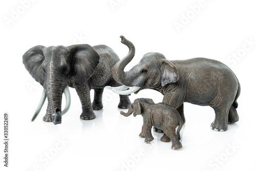 Elephant Family isolated on white background. elephant toys