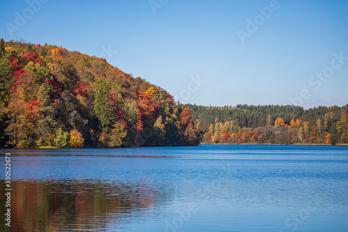 Autumn foliage around the Green Lake in Vilnius, Lithuania