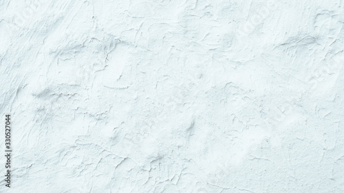 White abstract background. Textured cement wall. Painted rough surface.