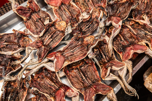 dried frogs in the sun for food preservation