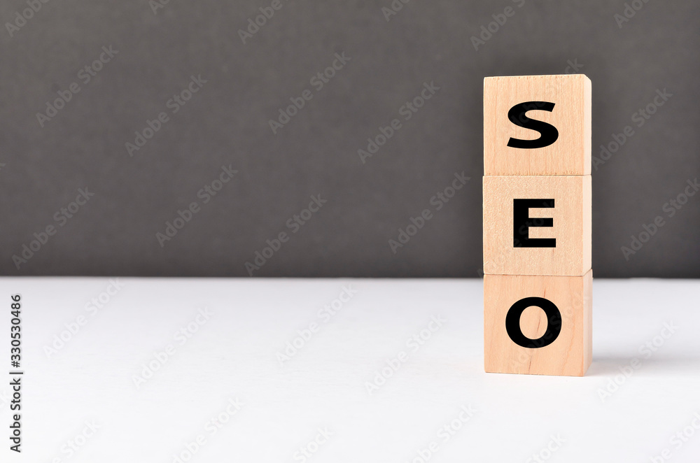 Wooden cubes with SEO text on white background. Wooden cubes with SEO text on white background.
