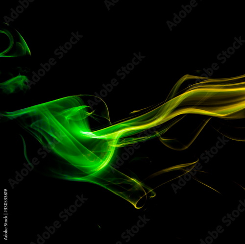 Colored smoke on black background