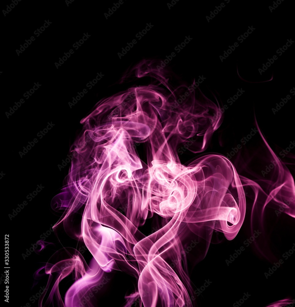 Fototapeta premium Purple smoke on black background