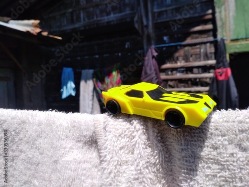 illustration of a yellow race car