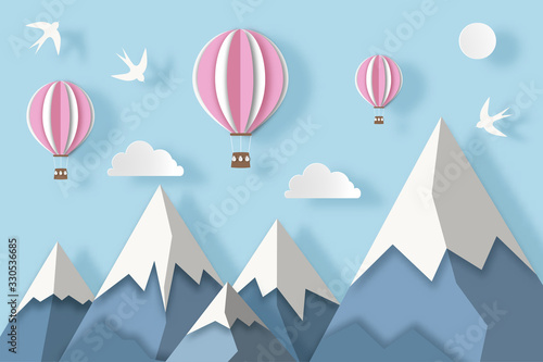 Landscape with snowy mountains, hot air balloons, clouds and birds. Paper art digital craft style. Vector illustration