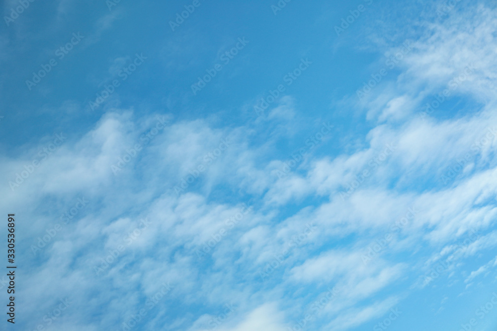 Beautiful blue sky with white clouds on sunny day