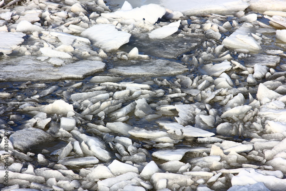 broken ice floes during the spring ice break on the river broken ice floes during the spring ice break on the river