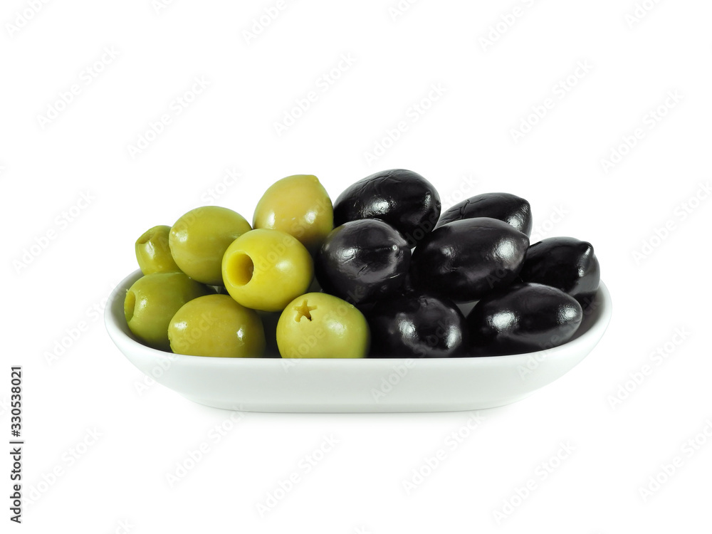 Large dried black olives with stones in oil and pickled green pitted olives in bowl isolated on white background Large dried black olives with stones in oil and pickled green pitted olives in bowl isolated on white background