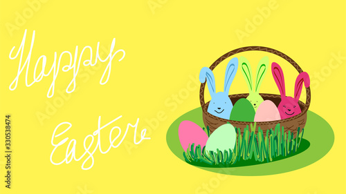 basket with easter multi-colored eggs. three eggs with rabbit ears, and two lie on the grass near the basket on a yellow background with white handwritten Happy Easter lettering