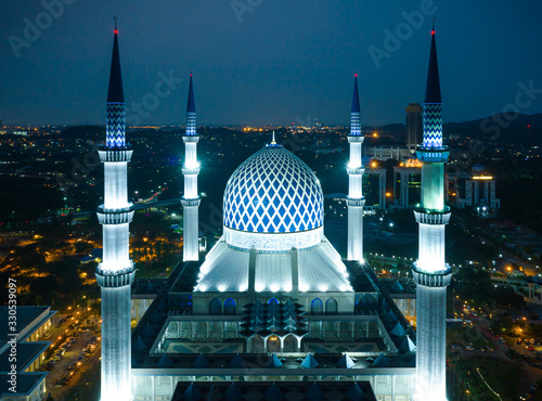 Photos Aerial View Of Sultan Salahudin Abdul Aziz Shah Mosque at twilight time in Shah Alam, Malaysia