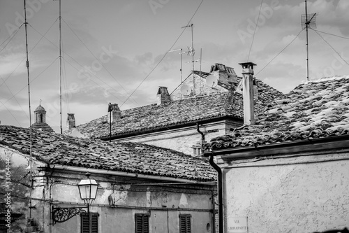 A group of roofs in a old town in Italy