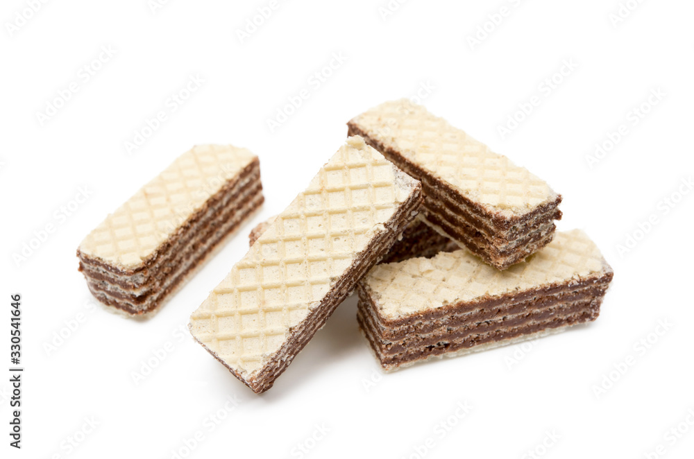 Crispy wafers with creamy hazelnut filling isolated on white background Crispy wafers with creamy hazelnut filling isolated on white background